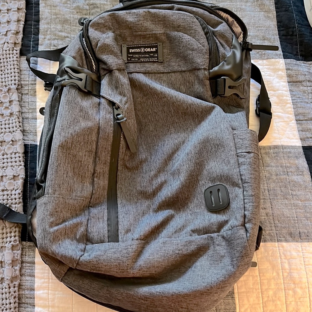 SwissGear backpack.  Minimal usage but very much like new!